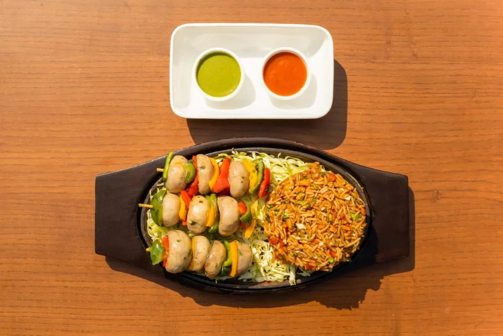 Veg Sizzler with Chutneys at Café Aketa Restaurant — Hotel Aketa Dehradun