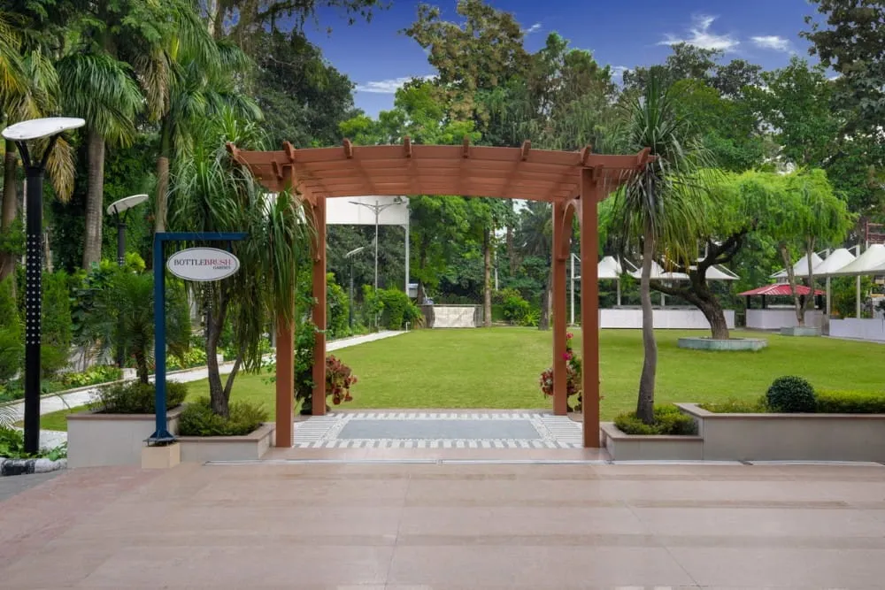 Bottlebrush Garden Pergola Entrance — Outdoor Event Venue Hotel Aketa Dehradun