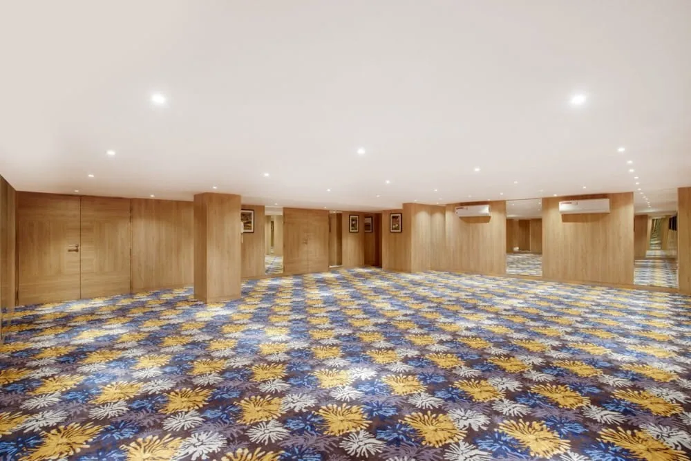 Chamber Hall Empty Banquet Setup with Floral Carpet — Hotel Aketa Dehradun