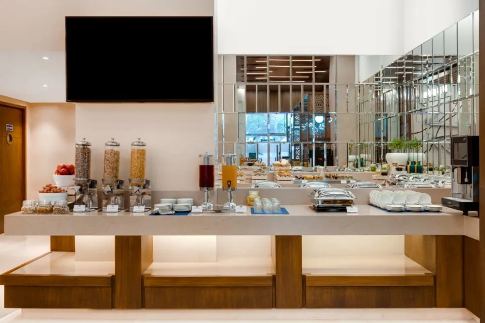 Café Aketa Restaurant Interior with Buffet Counter — Hotel Aketa Dehradun