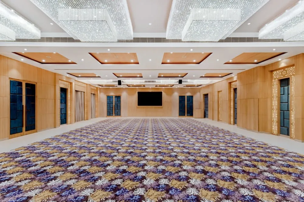 Somerset Hall Empty Banquet Hall with Floral Carpet — Hotel Aketa Dehradun