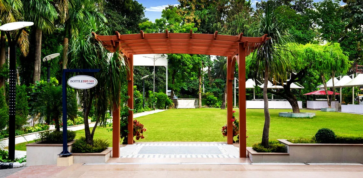 Bottlebrush Garden Outdoor Lawn Venue for Events and Weddings — Hotel Aketa Dehradun
