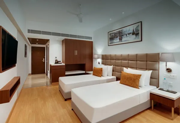 Deluxe Twin Room at Hotel Aketa Dehradun — Twin Beds for Friends and Families