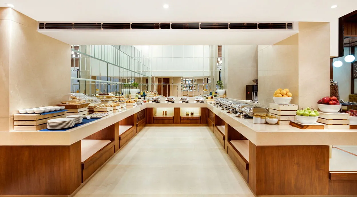 Café Aketa Interior — Elegant Dining Area at Hotel Aketa Dehradun